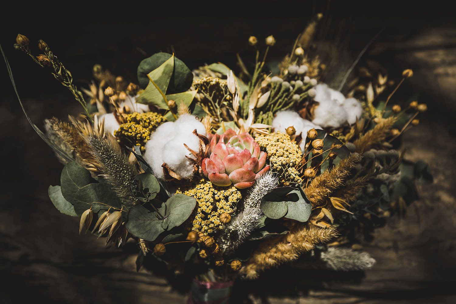 Wedding bouquet with dried flowers. Cotton, succulent, spikelets
