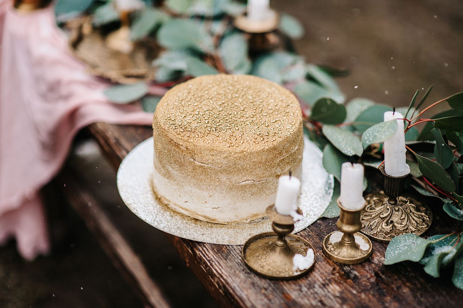 wedding decor with a golden cake